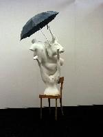 Pjotr Müller, 'Maak je eigen god', met stierenkop, geitenonderlijf, torso v Artemis; de elementen op een stoel geplaatst.
PHŒBUS•Rotterdam